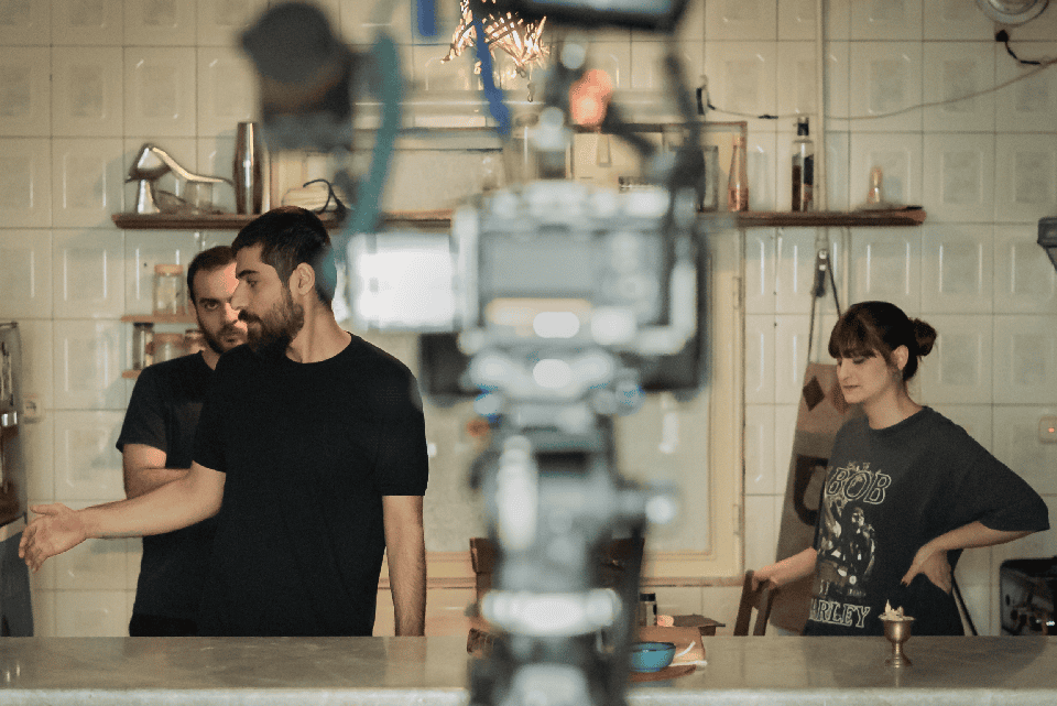 Moein Rahmanzadeh Directing the Cast of Withered Pomegranates Moein Rahmanzadeh directing Behrad Selahvarzi and Zeinab Shabanian on the set of Withered Pomegranates